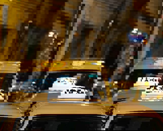 Taxis waiting at night