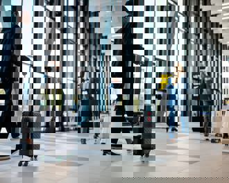 Business travelers in airport terminal