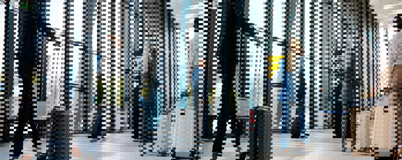 Business travelers in airport terminal