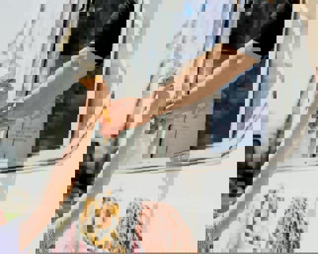 Little girl getting ice cream