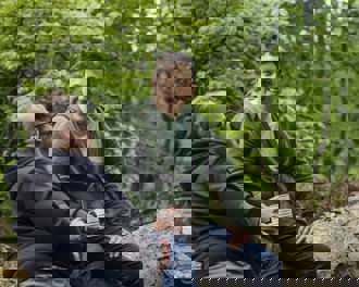 men sitting on tree talking.jpg