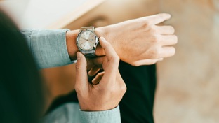 A watch on a mans wrist