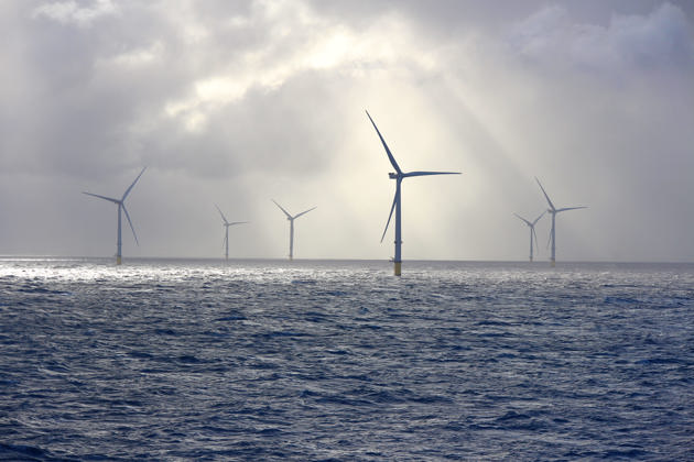 Sunbeams on an offshore wind farm turbine