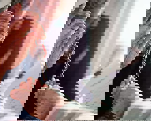 Real estate agent passing keys