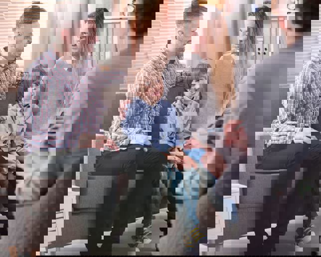 Psychotherapist helping family relationship counseling