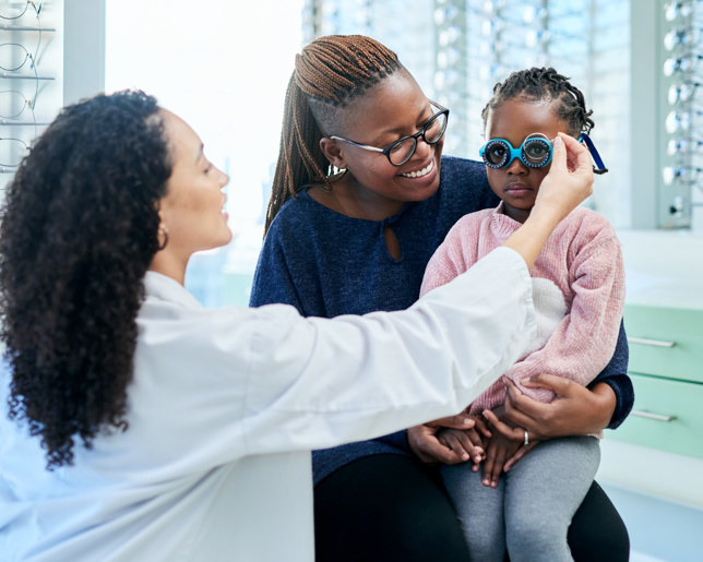 Woman and kids optometrist for eye test