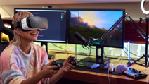 Woman wearing virtual reality headset gaming