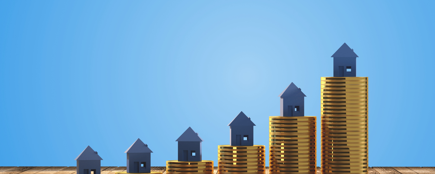 Five miniature house models are placed on stacks of gold coins arranged in increasing height from left to right.