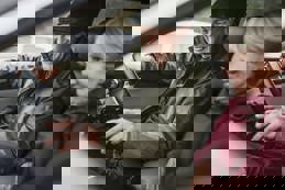 Happy senior couple on road trip