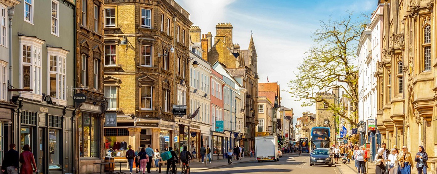 A busy high street with shoppers 