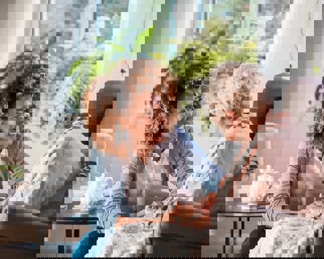 Nurse supporting eldery lady