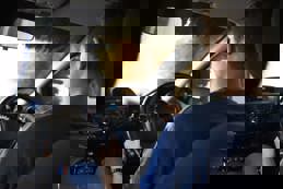 Motorist Driving Through Automated Car Wash