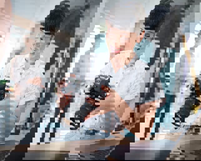 Photographer reviewing photoshoot results