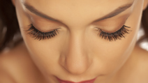 Closeup of beautiful closed eyes and eyelash extension