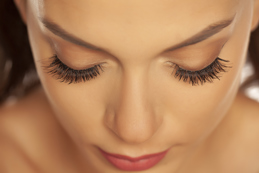 Closeup of beautiful closed eyes and eyelash extension