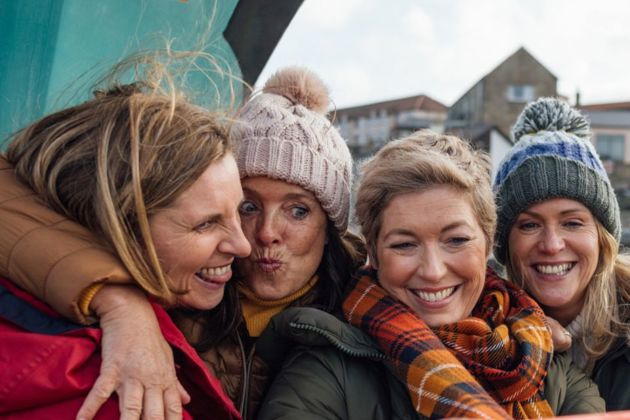 Group of woman taking a selfie together