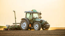Tractor drilling seeding crops