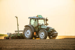 Tractor drilling seeding crops