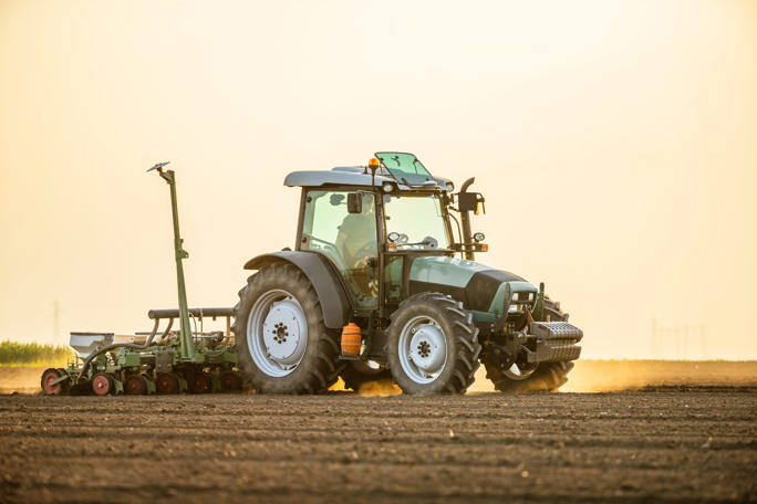 Tractor drilling seeding crops