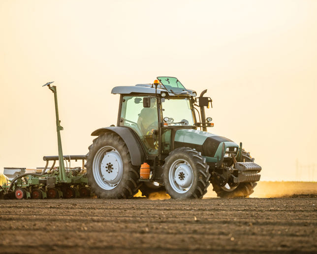Tractor drilling seeding crops