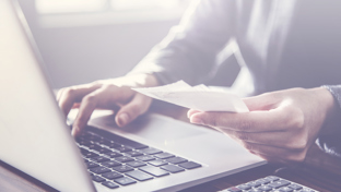 A man replying an email