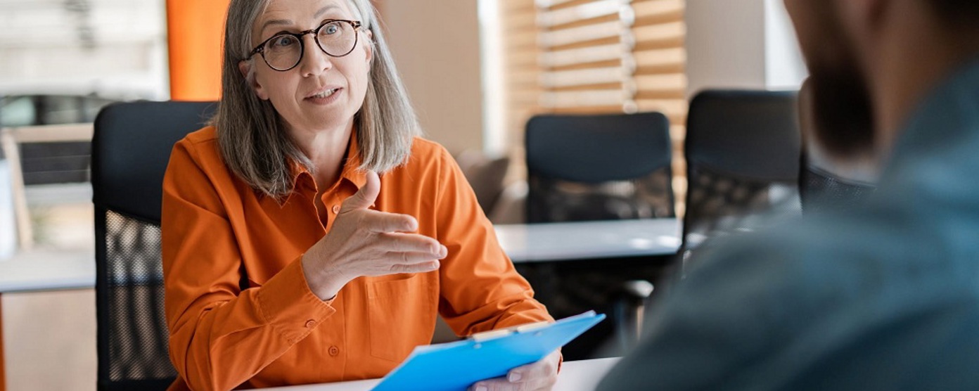 Mature lady in a business meeting