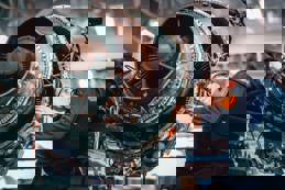 Aircraft engineer repairing airplane 