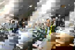 Delivery driver preparing parcels