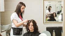 Getting hairstyle done at hairdresser