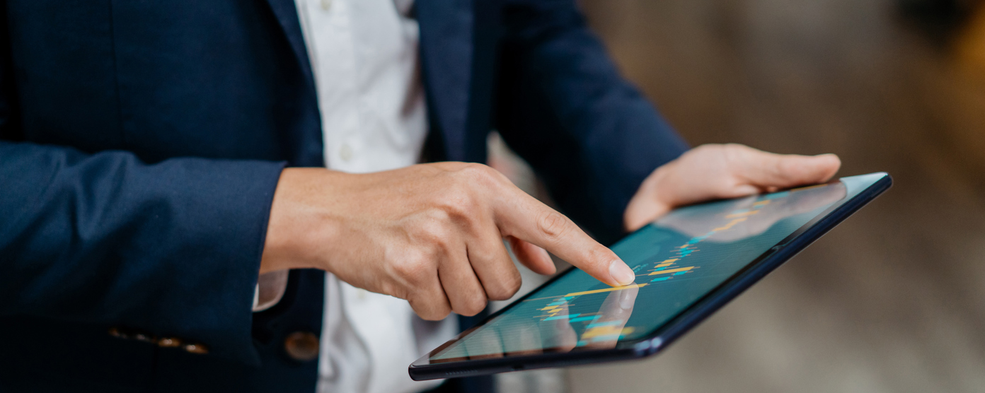 Man checking progress chart on tablet