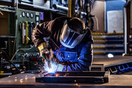 Industrial worker welding 