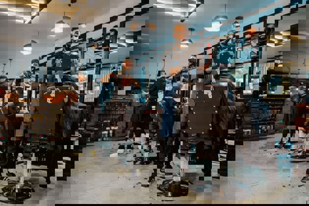 Hairdressers serving clients 