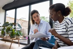 Financial advisor talking to woman