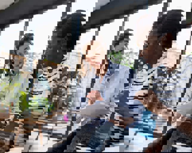 Financial advisor talking to woman