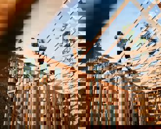 Construction Crew Framing of New Home