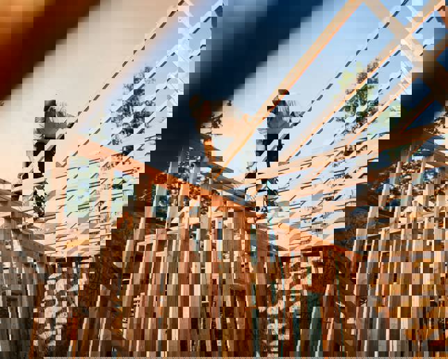 Construction Crew Framing of New Home