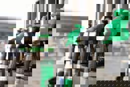 Gas station with diesel petrol nozzles