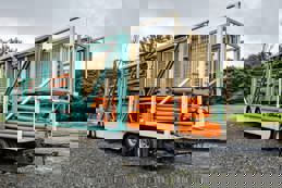 Showperson transporting rollercoaster parts