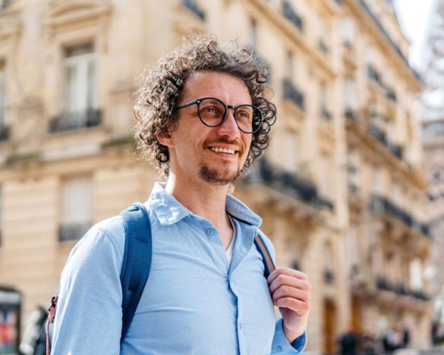 Male with a backpack abroad.jpg