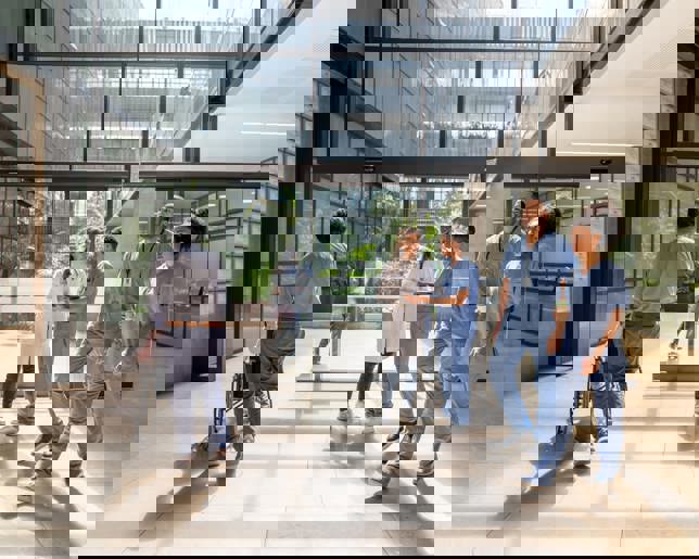 Hospital corridor staff and patients