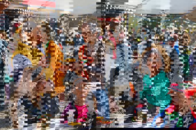 Two families enjoying a day out at a family friendly halloween fright festival