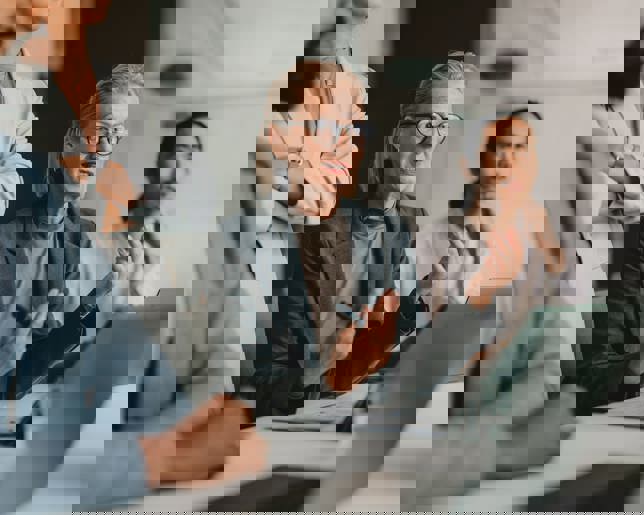 Group of professionals in business meeting