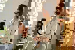 Mom making childs hairstyle