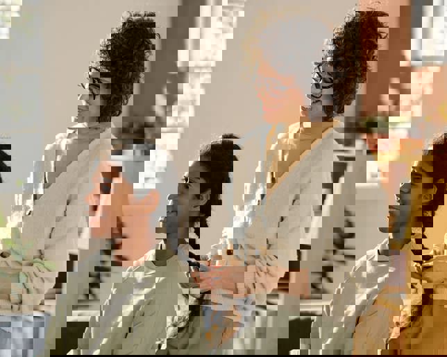 Mom making childs hairstyle