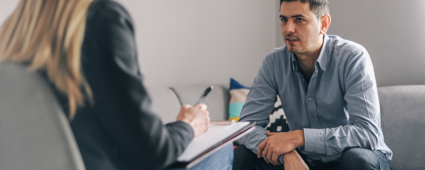 Guide to care home insurance illustrated by a caring senior setting with supportive staff and a reassuring professional tone