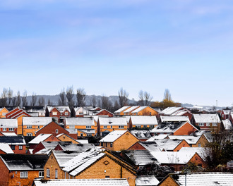 housing-estate-snow-dusted-rooftops-of-detached-and-semis.jpg