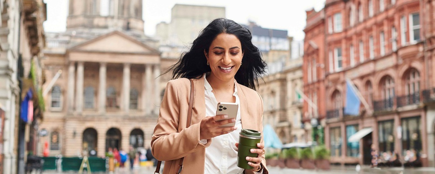 Businesswoman walking through a city