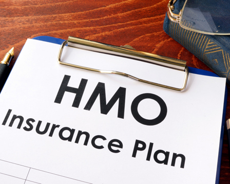 Home insurance plan document with fountain pen