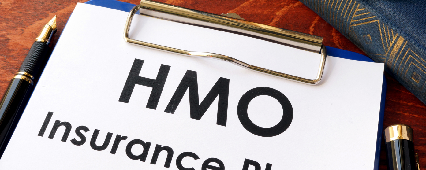 Home insurance plan document with fountain pen