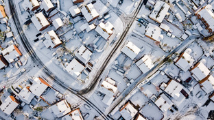 header-drone-view-of-housing-estate-in-the-snow.jpg